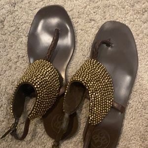 Brown BCBG sandals with heavy gold detailing